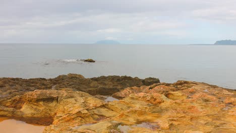rocky seafront of marsala, province of trapani in sicily, italy. wide shot