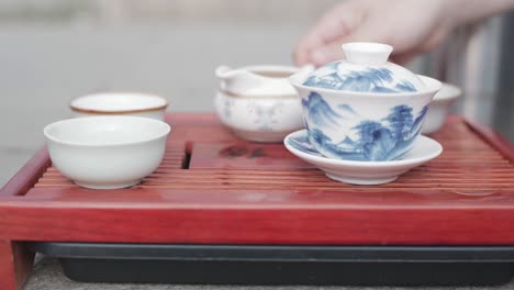 pouring tea during a traditional chinese tea ceremony