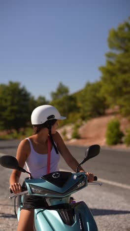 young woman on scooter