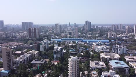 drone footage of goregaon india best view goregaon railway station view blue roof sunny day