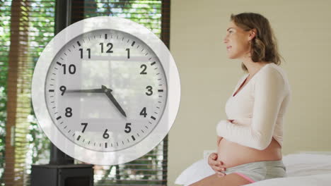 reloj en movimiento rápido sobre feliz embarazada mujer caucásica sonriendo y sosteniendo el vientre