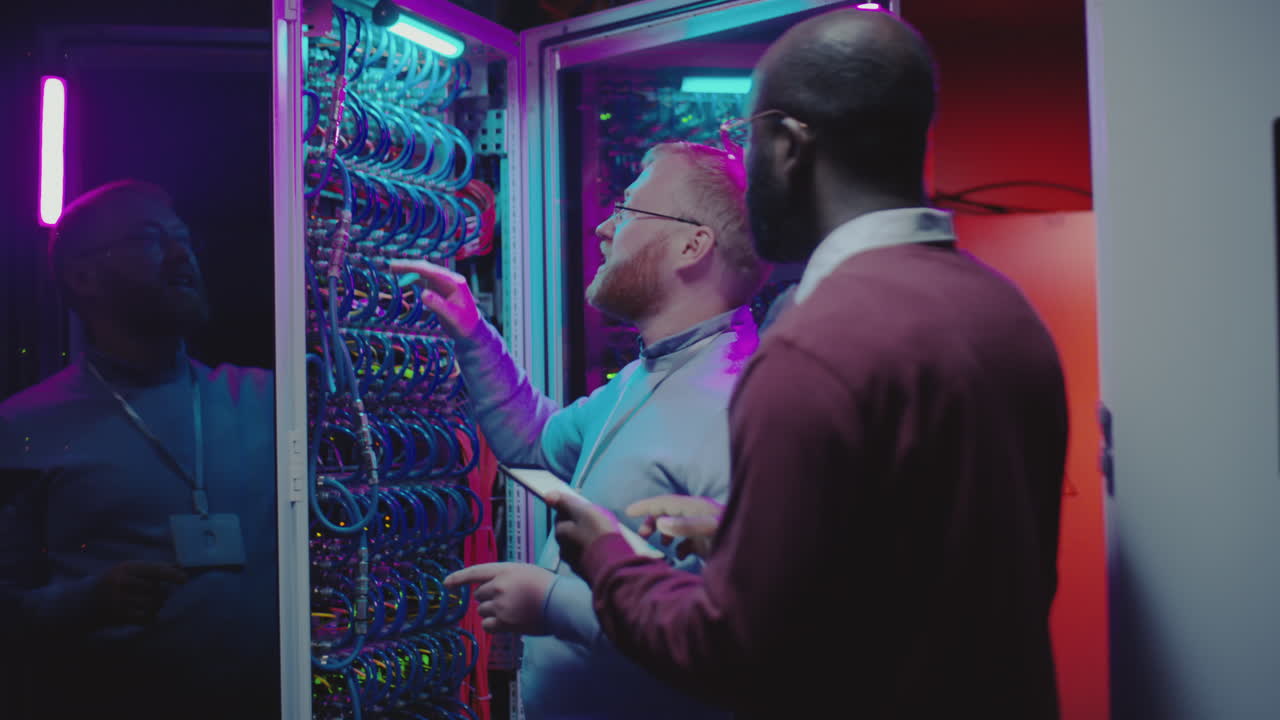 IT Professionals Working in a Server Room