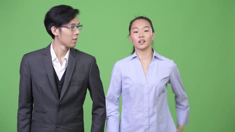 young asian business couple together