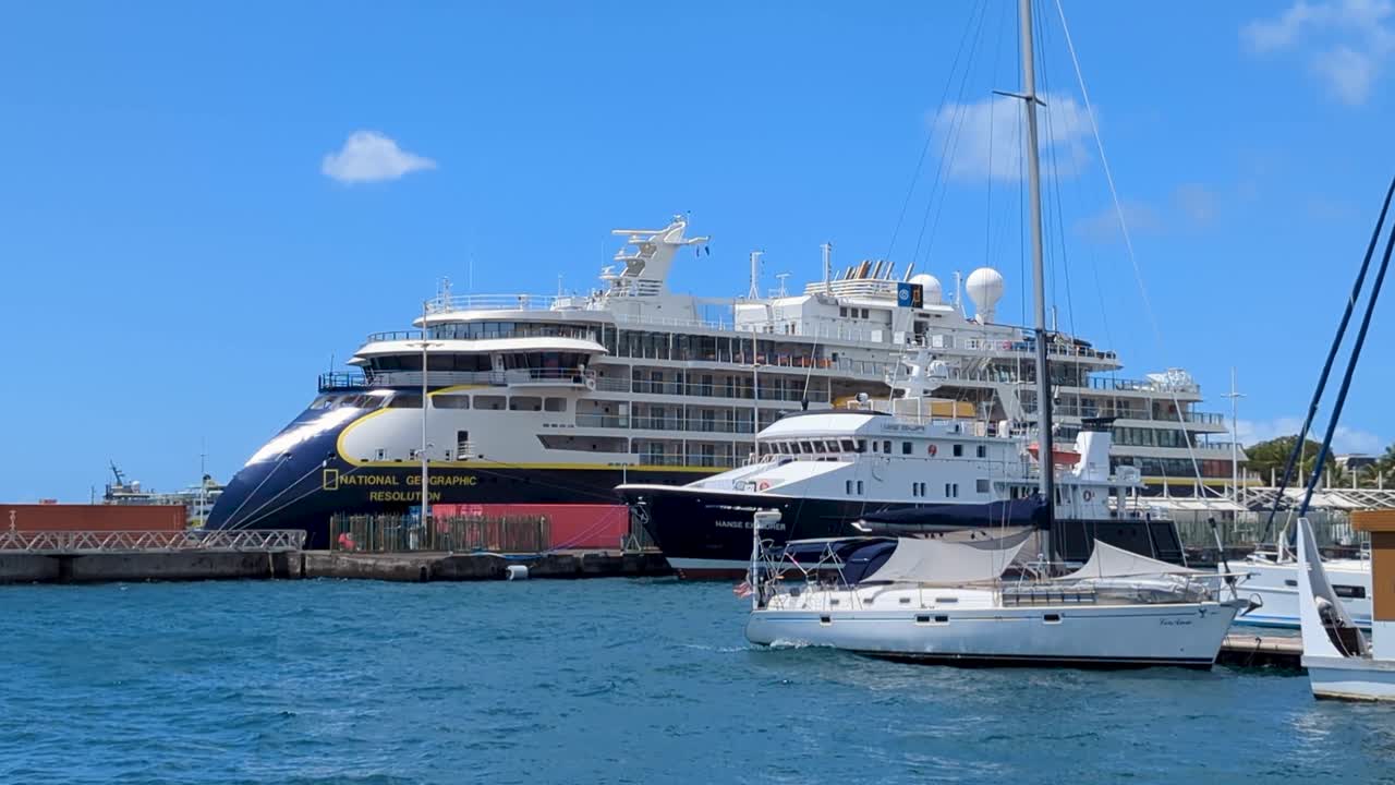 National Geographic Resolution next-generation expedition cruise ship docked in Papeete harbour in Tahiti, French Polynesia, South Pacific