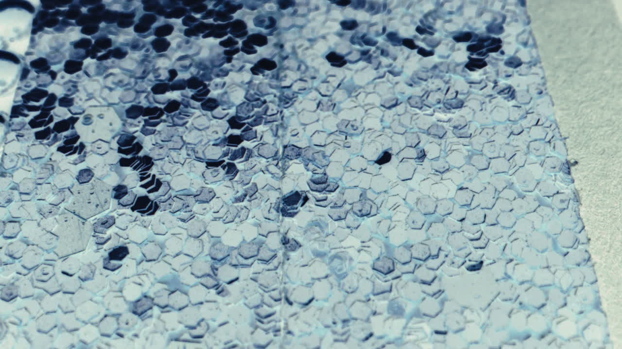 Close-up of a glittery hexagonal pattern