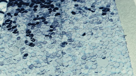 close-up of a glittery hexagonal pattern