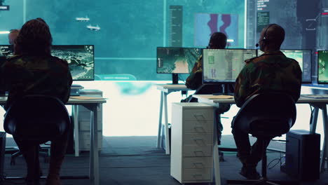 military crew working in reconnaissance control tower power base