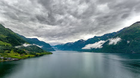 spectacular cloudscape above hardanger settlement, norwegian coastal