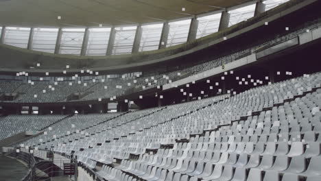 animation of white squares moving over empty stadium