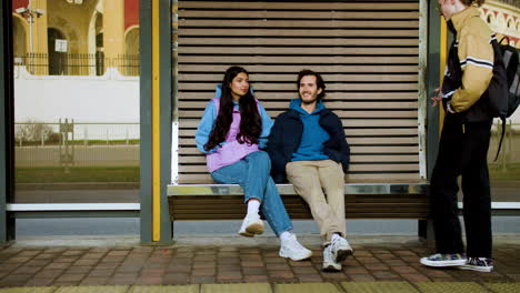 couple at bus stop