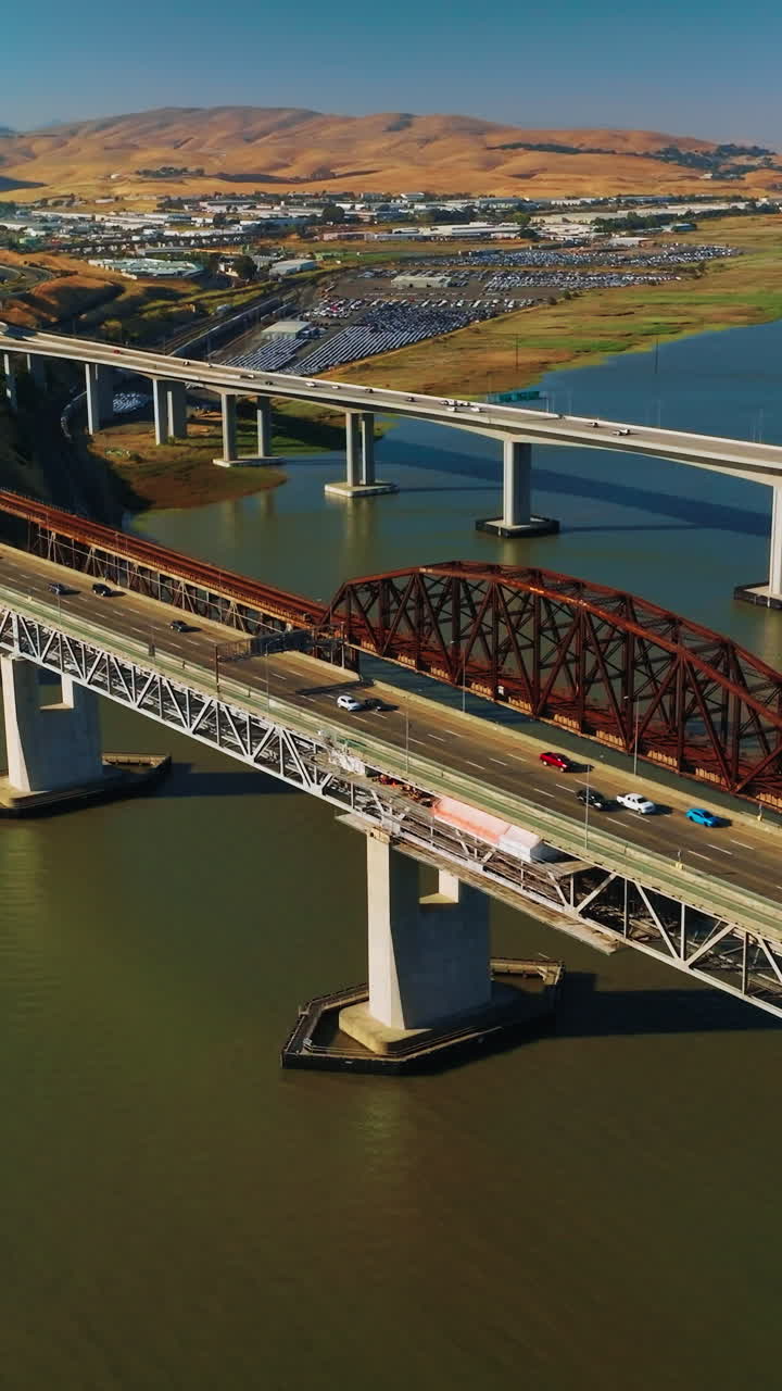 Martinez bridge connecting to Benicia aerial view. Steel usa california bridge. Vertical video