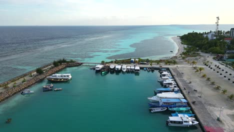 aerial view of dhangethi bridge harbour including fishing and dive boats, maldives, indian ocean