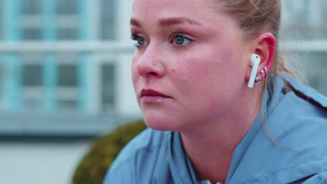 Sport-jogger-woman-in-sportswear-getting-her-breath-back-after-run-training-sweat-dripping-from-nose