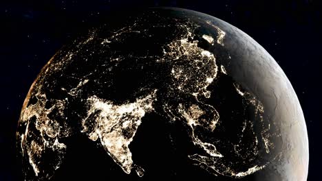 orbiting globe shows illuminated city lights in india - view from space of earth