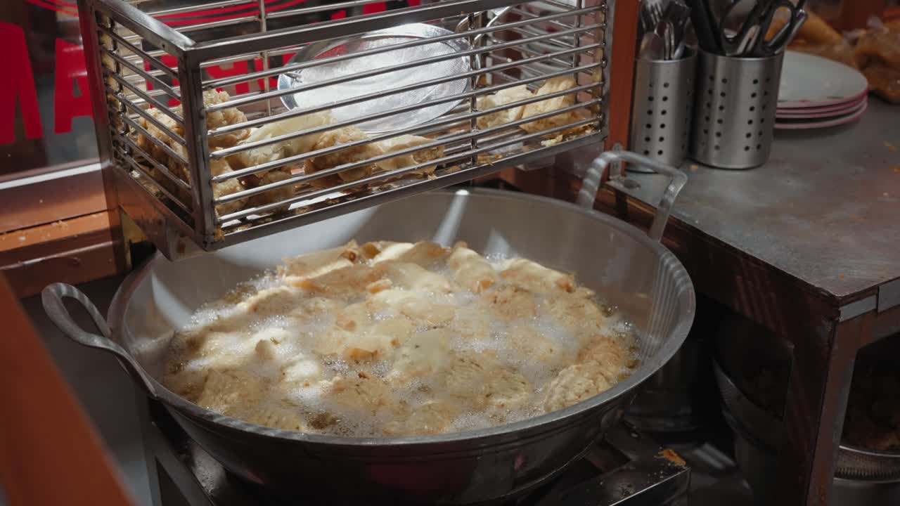 Delicious Street Food Fritters Deep Frying in Hot Oil