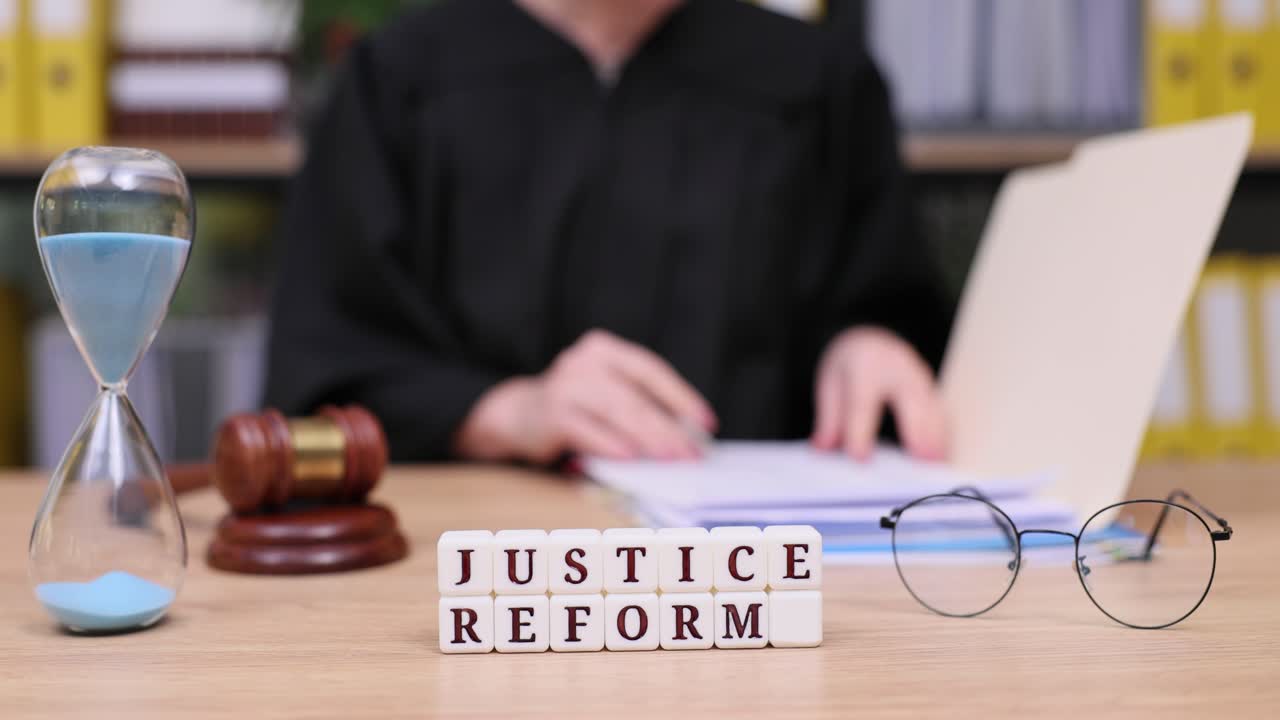 Justice Reform Concept with Judge and Legal Symbols