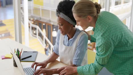 Young women working in a creative office