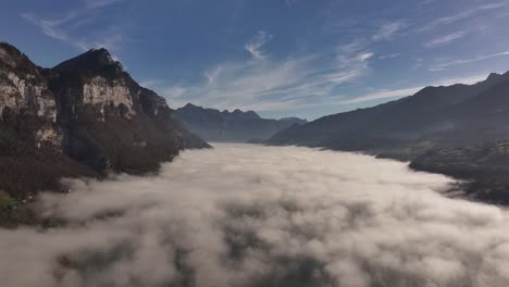 stunning aerial view of a valley covered in fog