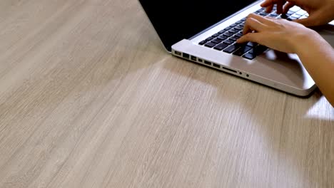 woman hands typing on laptop keyboard, with space for text , good for use on web banner