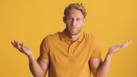 Bearded-blond-man-saying-no-and-raising-his-arms