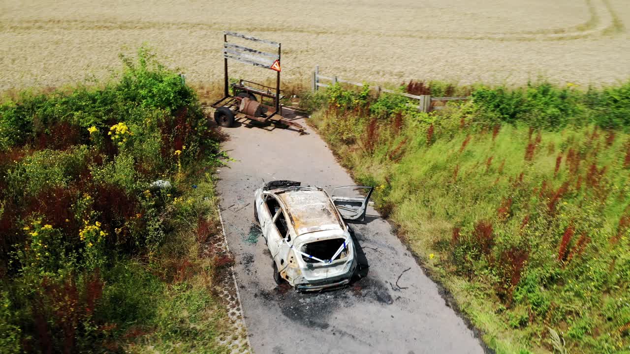 Video of a stolen car after it has been burnt out to destroy evidence