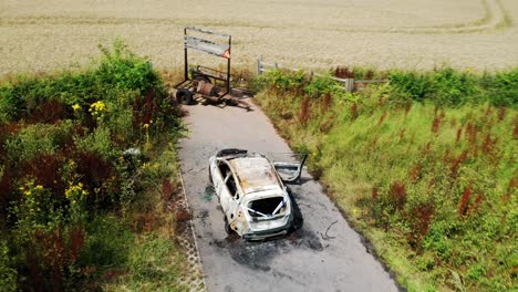 video of a stolen car after it has been burnt out to destroy evidence