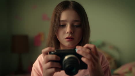 young girl looking at a camera