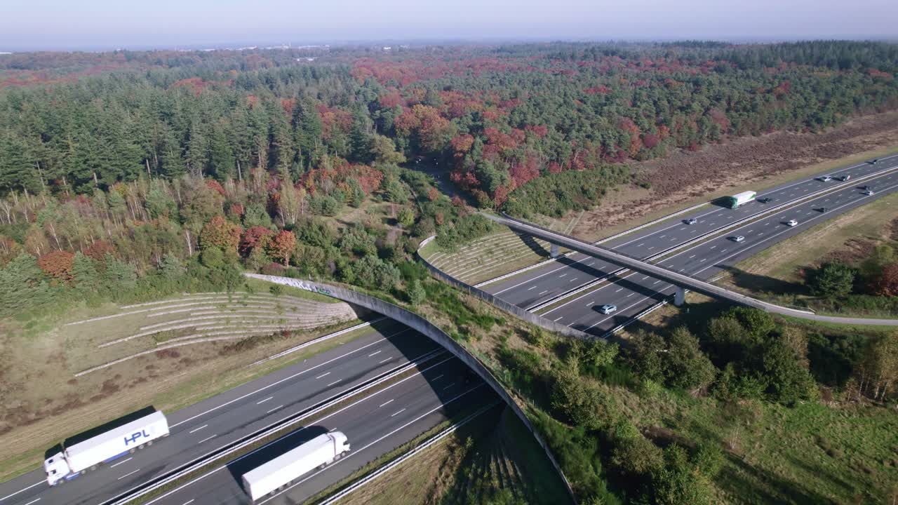 Aerial View of a Highway with a Wildlife Overpass in Autumn