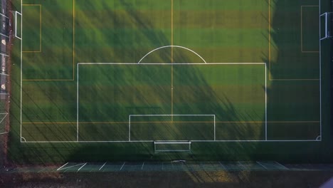 aerial of football pitch with artificial green turf