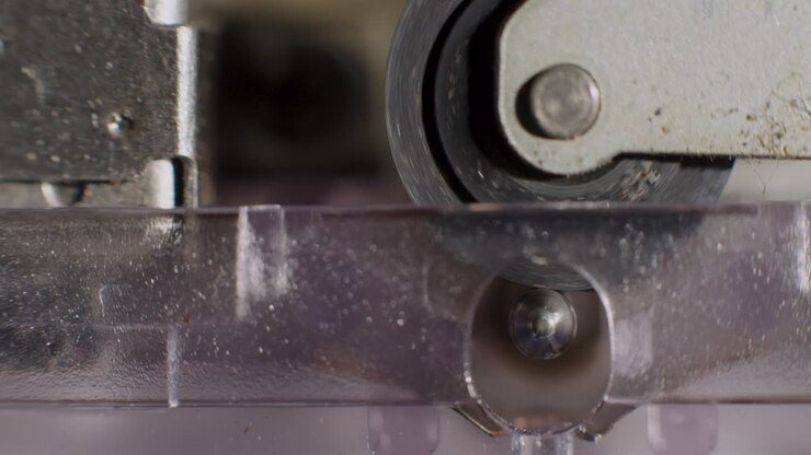 Extreme Close-Up Of Microcassette Pinch Roller Spinning