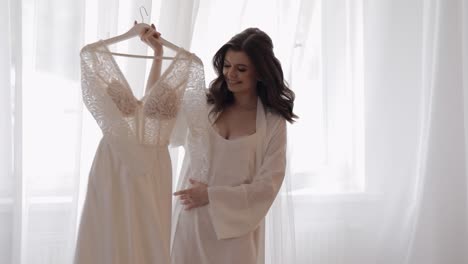 bride getting ready in a white dress