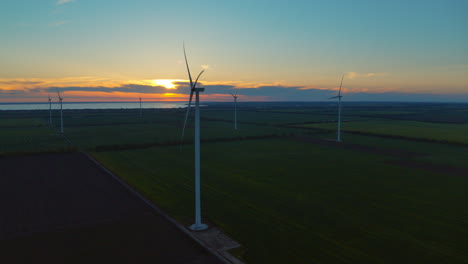 Modern-windmills-producing-renewable-alternative-energy-in-rural-landscape.