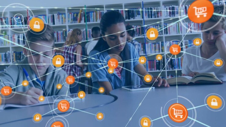Trio studying at table in library, cart icon appearing on tablet, multiplying into padlock network