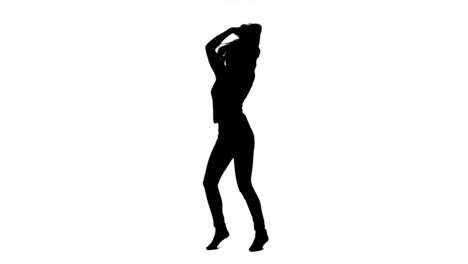 a silhouette dancing woman