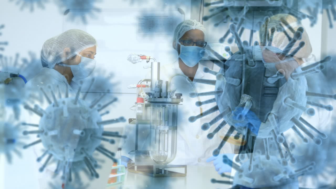 코로나바이러스 코로나19의 확산에 대한 애니메이션으로 보건 의료 종사자들이 배경으로 있습니다.