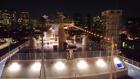 luxurious deck of seven seas grandeur cruise ship at night. aerial