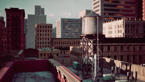 rooftop view of a city with water tower