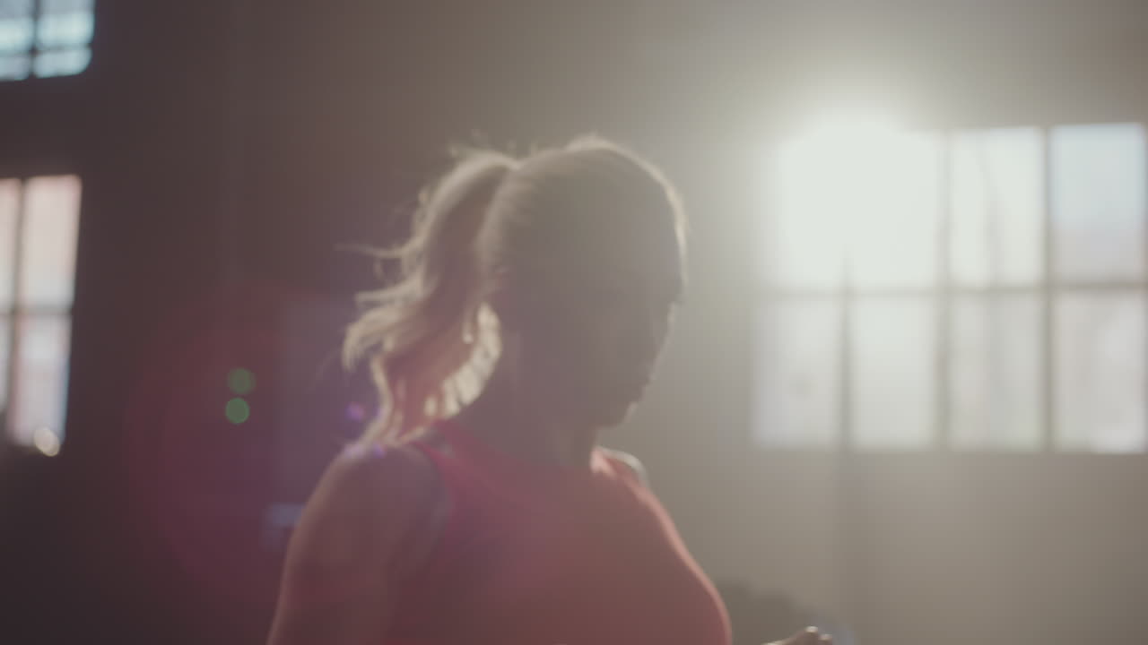 Woman working out on a rowing machine