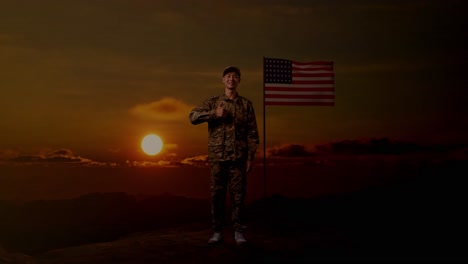 full body of asian man soldier smiling and showing thumbs up gesture while standing with flag of the united states, sunset time