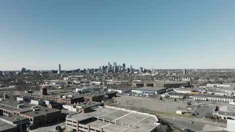 push in aerial drone shot of the downtown minneapolis skyline, in the twin cities of minnesota