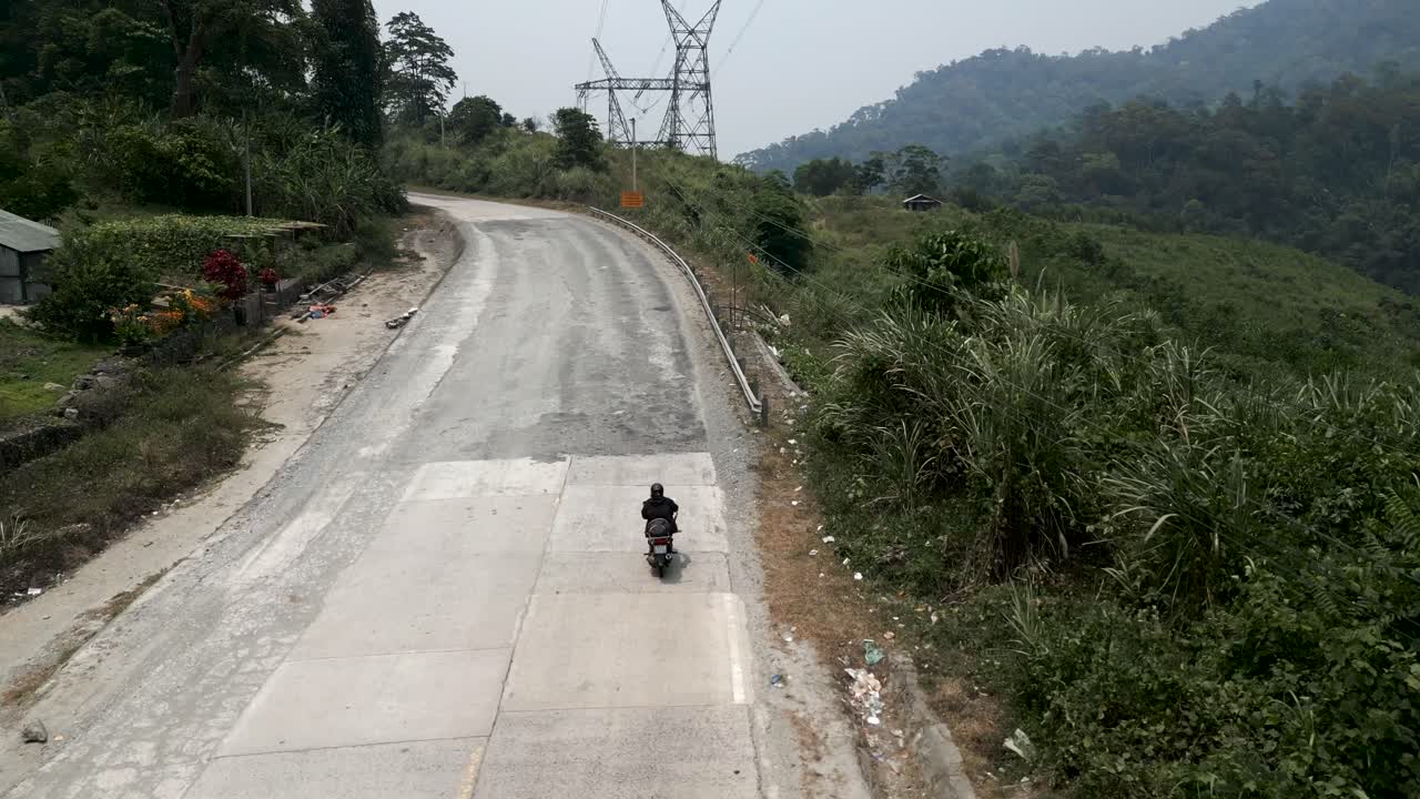 Motorcycle on a Mountain Road