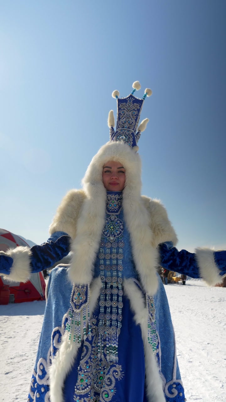A woman in a traditional costume poses outdoors. The scene showcases vibrant colors and cultural details.