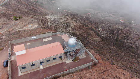 aerial shot in orbit of the dome of the temisas observatory in the municipality of aguimes on the island of gran canaria