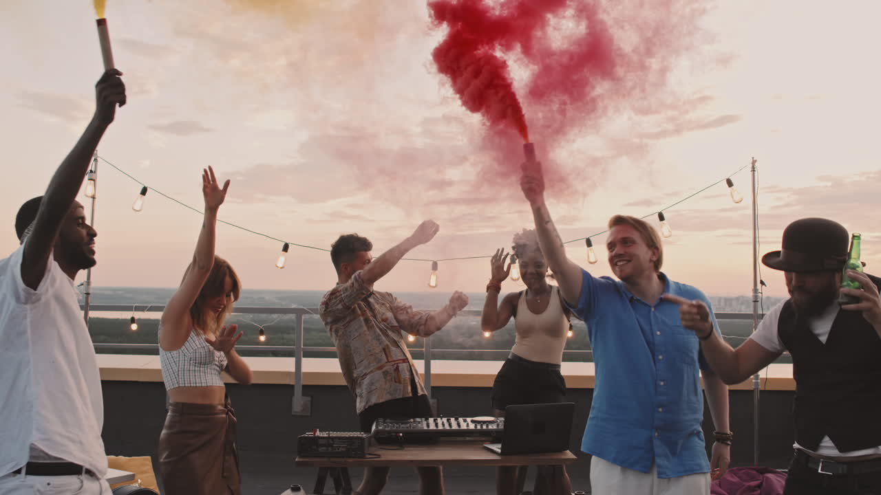 Happy People Partying on Rooftop Terrace in Summer