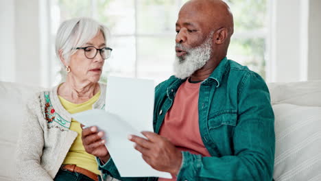 documents, discussion and senior couple