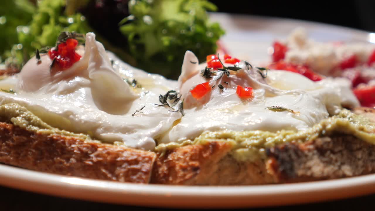 Burrata toast with avocado and salad