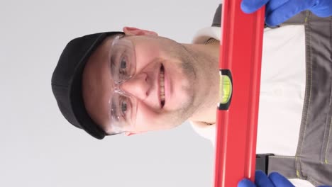 man with water building level construction tool equipment repair