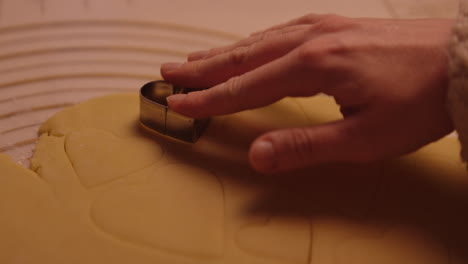 making heart-shaped cookies