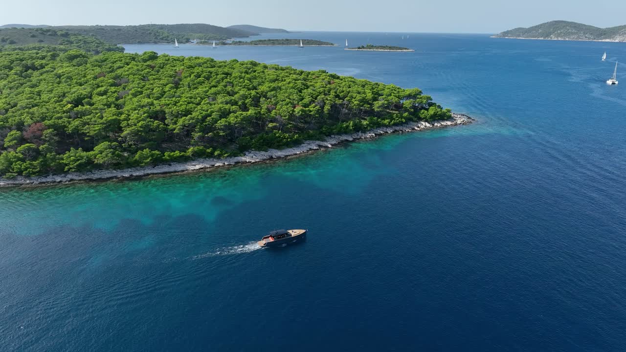 Boat Sailing in Pakleni Islands Adriatic Sea - Aerial Orbit Sunny Day