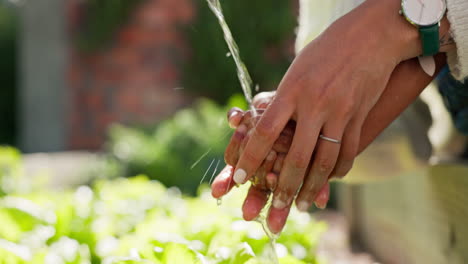 water, hydration and a mother washing hands